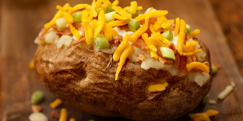 How to Cook Jacket Potato in the Air Fryer topped with cheese and spring onion