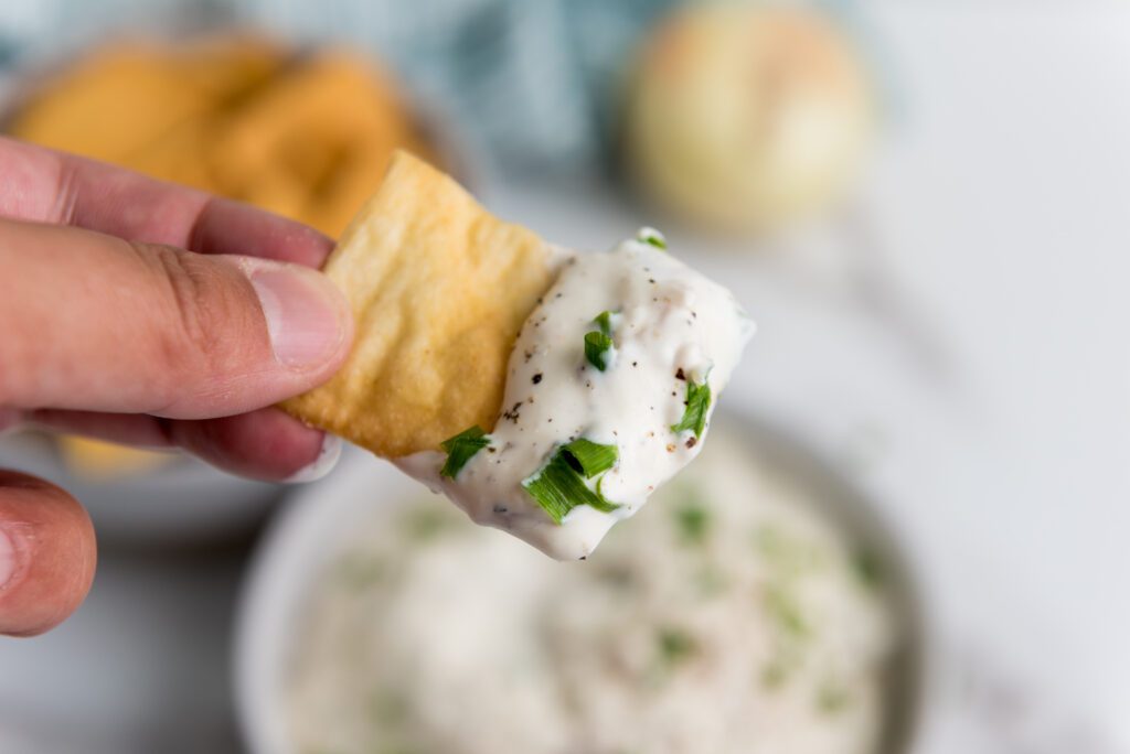 Caramelized Onion Dip on a potato chip